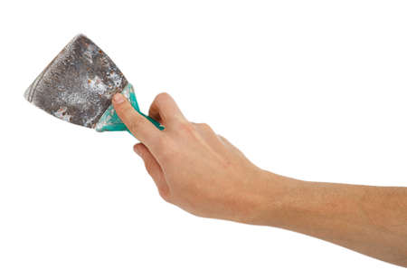Old trowel in male hand isolated on white background