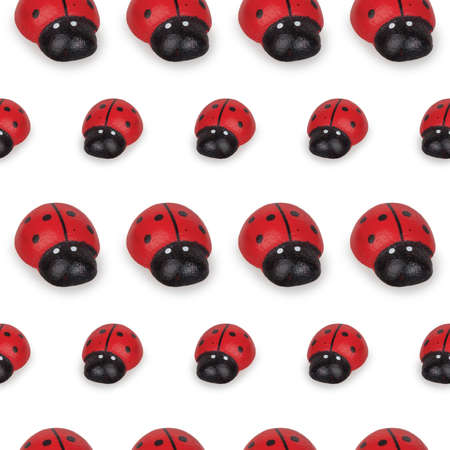 Seamless decorative pattern ladybugs on white backgroundの写真素材