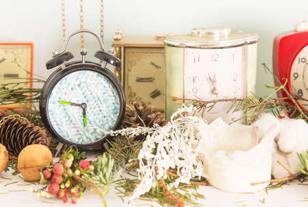 Alarms on the shelf white fireplaceの写真素材