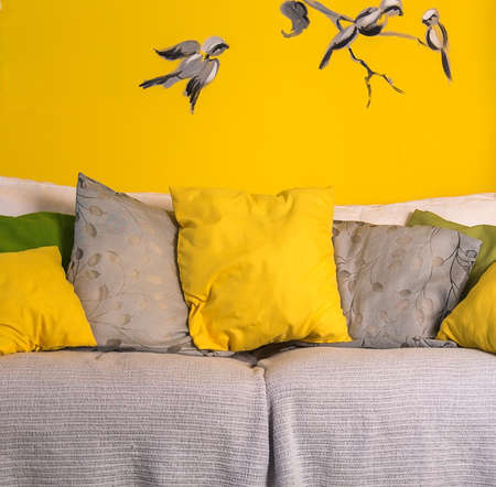 interior sofa with colorful pillowsの写真素材