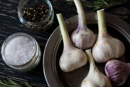 Rosemary, garlic, salt - culinary background.の写真素材