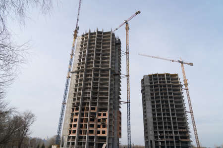 Constraction site with crain and new buildingの写真素材