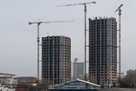 Constraction site with crain and new buildingの写真素材