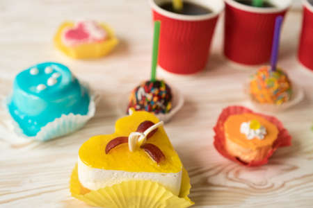 Delicious cupcakes with drinks.の写真素材