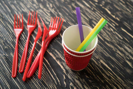 Cups and red forks.の写真素材