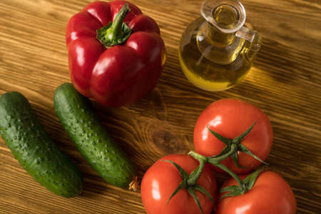 Salad ingridients. Tomato, olive, oil, paprika and cucumber.の写真素材