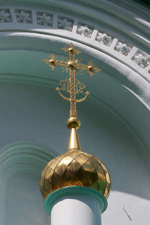 Svyatogorsk. Donetsk region. Ukraine. June 12, 2021. Golden dome with a cross on the building of the Holy Dormition Cathedral in the Svyatogorsk Monasteryのeditorial素材