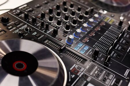 Close up of professional dj controller. Selective focus.の写真素材
