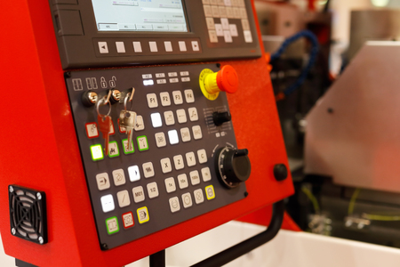 Control panel of metalworking CNC machinery. Selective focus.の写真素材