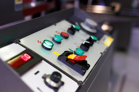 Control panel of a metalworking machine. Selective focus.