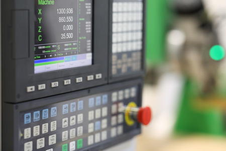 CNC control panel of lathe machine. Selective focus.の写真素材
