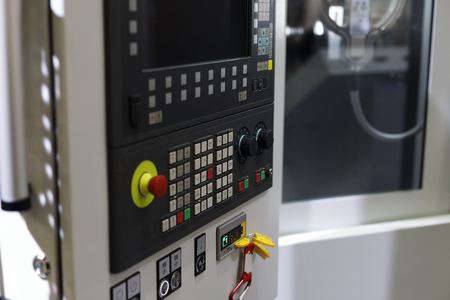 Metalworking machining center with CNC control panel. Selective focus.の写真素材