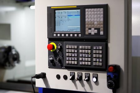 CNC machine control panel close up. Selective focus.の写真素材