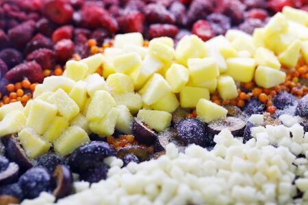 Assorted deep frozen fruits and berries. Selective focus.の写真素材