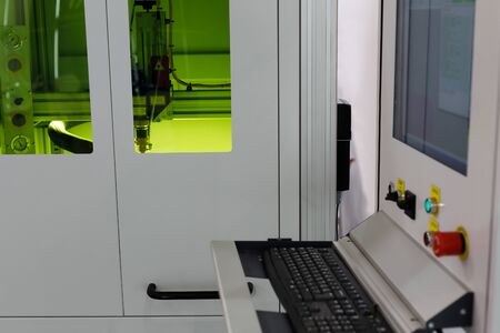 Industrial CNC laser cutting machine. Selective focus.
