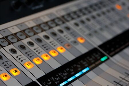 Digital sound mixing console at recording studio. Selective focus.