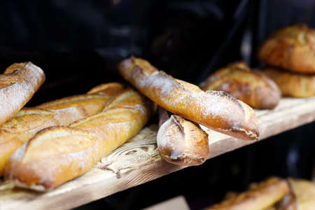 Baguettes on the shelf at a bakery. Selective focus.