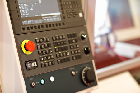 Control panel of CNC machining center close up. Selective focus.の写真素材
