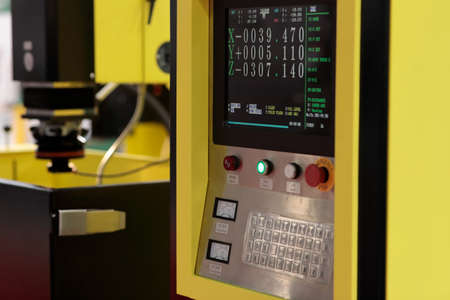 Control panel of CNC electrical discharge machine. Selective focus.の写真素材