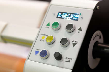 Control panel of inkjet large format printer. Selective focus.
