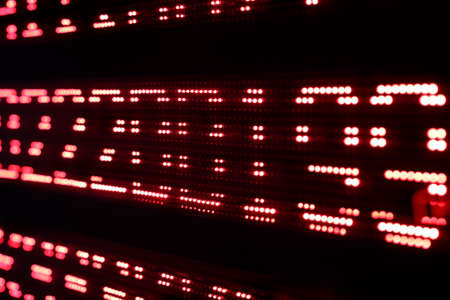 Multi-line scrolling message LED display. Selective focus.