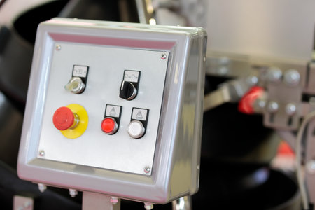 Remote control console in food production factory. Selective focus.
