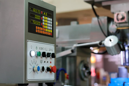 Control panel with digital readout of metalworking machine. Selective focus.の写真素材