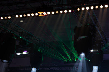 Stage lighting equipment at indoor live event. Selective focus.の写真素材