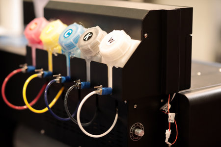 Ink supply unit of big format inkjet printer closeup. Selective focus.