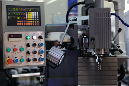 Vertical milling machine with digital readout DRO system. Selective focus.