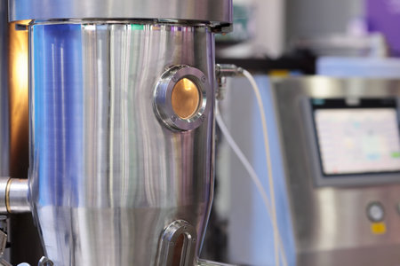 Close up of automatic pharmaceutical powder granulator machine. Selective focus.の写真素材