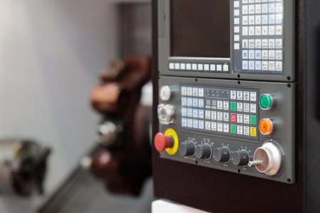 Control panel of turret type CNC turning center. Selective focus.