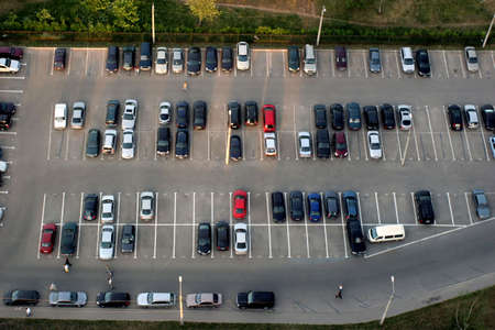 Cityscape with cars on parking. The top view