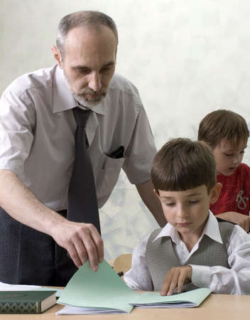 The teacher and the pupils の写真素材