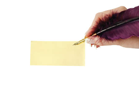 Blank visiting card and hand with feather isolated on whiteの写真素材
