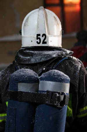Firefighter, going to rescue in a fire.の写真素材