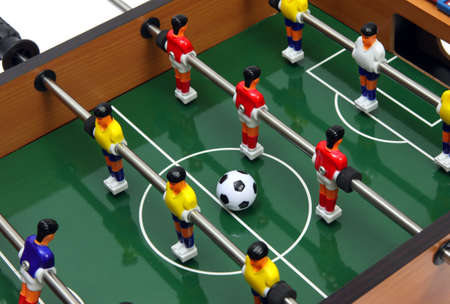 Football  players on the grass field background. Board game.