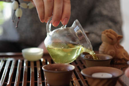 Traditional tea ceremony is perfomed by tea master
