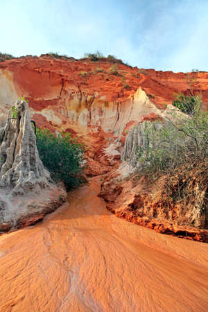 Ham Tien canyon in Vietnam, small stream carving through the sand