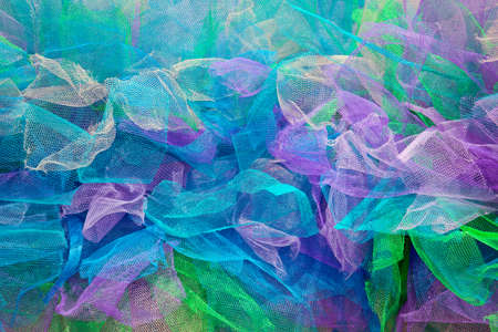 Background from multi-colored pieces of fabricの写真素材