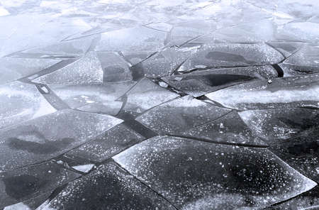 Ice floes background of winter river.