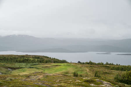 Golf course at The Tornetrask Lake Area in Swedenの写真素材