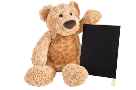 Teddy bear with slate board.の写真素材