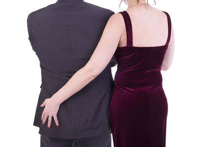 Female grabbing male buttocks, tenderness concept. Isolated on white background.の写真素材