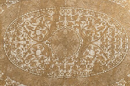 Floral lace background, close up. Golden color.の写真素材