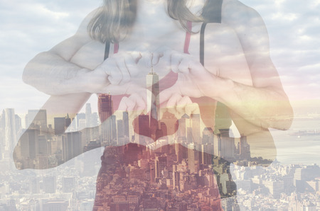 Double exposure of a couple in front of New York cityの写真素材