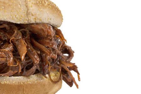 Close up on pulled pork sandwich isolated on white background.の写真素材