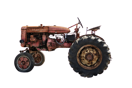 Rustic old red tractor, isolated on white background. Agriculture conceptの写真素材