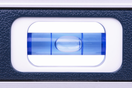 Real close up on a bubble level tool. Directly above.