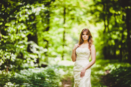 Bride portrait in the spring forestの写真素材